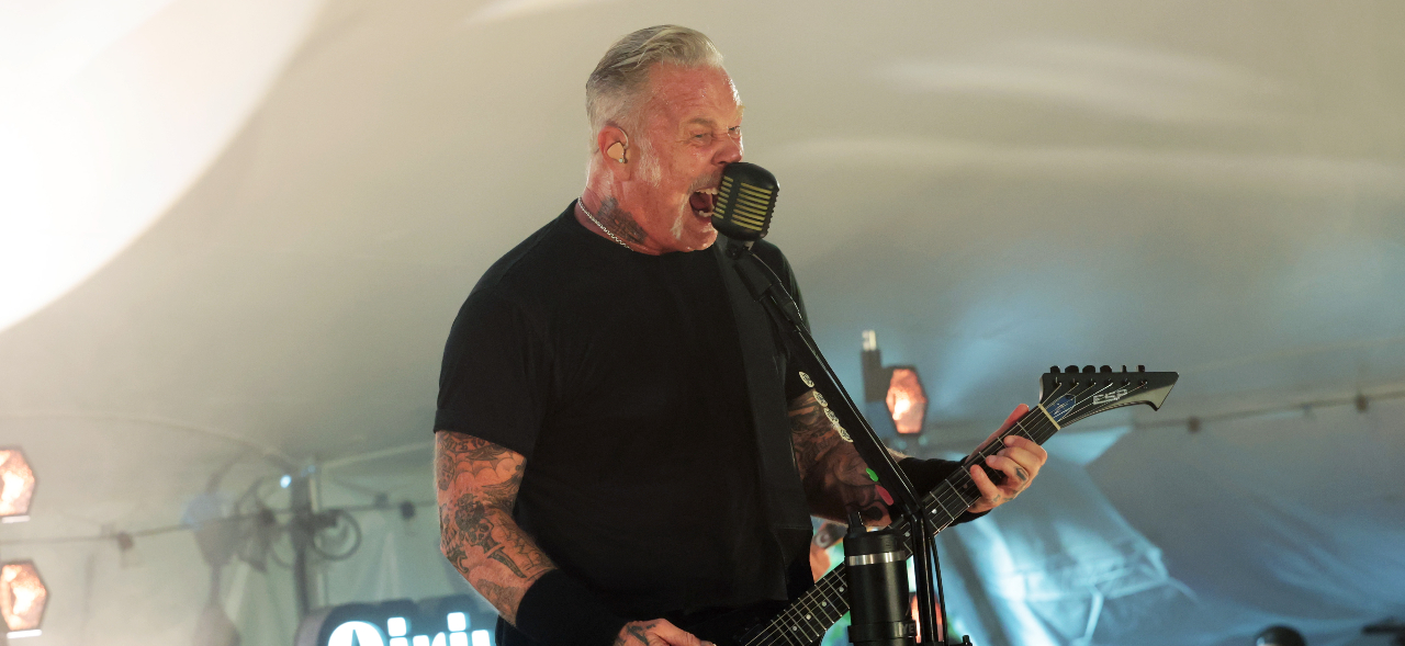 James Hetfield roaring into a microphone