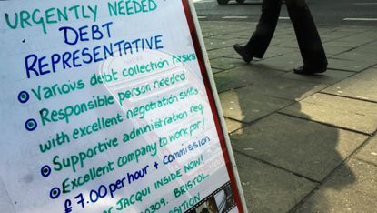 Advert for a debt collection agent is pictured in Bristol in 2009