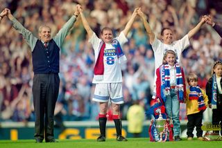 Manager Walter Smith (l) Paul Gascoigne and Trevor Steven (r) celebrate after Rangers had won their eighth title in a row after the Scottish Premiership match between Rangers and Aberdeen at Ibrox on April 28th, 1996 in Glasgow, Scotland. (Photo by Ben Radford/Allsport/Getty Images)