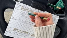 Lauren Katims marking a scorecard