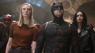Karen Page, Matt Murdock, and Jessica Jones looking up at an off-screen Wilson Fisk in Daredevil: Born Again season 2 episode 8