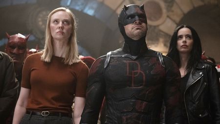 Karen Page, Matt Murdock, and Jessica Jones looking up at an off-screen Wilson Fisk in Daredevil: Born Again season 2 episode 8
