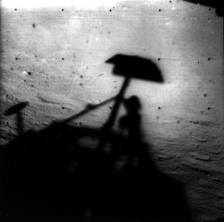 Surveyor 1 moon lander's shadow on the lunar surface.