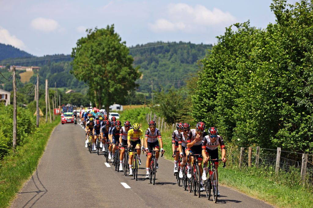 QUILLAN FRANCE JULY 10 Tadej Pogaar of Slovenia Yellow Leader Jersey Davide Formolo of Italy and UAETeam Emirates and Teammates lead The Peloton during the 108th Tour de France 2021 Stage 14 a 1837km stage from Carcassonne to Quillan LeTour TDF2021 on July 10 2021 in Quillan France Photo by Tim de WaeleGetty Images