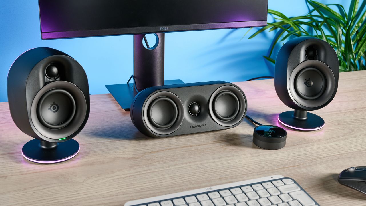 The SteelSeries Arena 9 front and central speakers on a computer desk