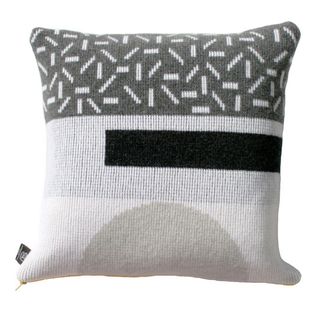 white and black cushion with white background