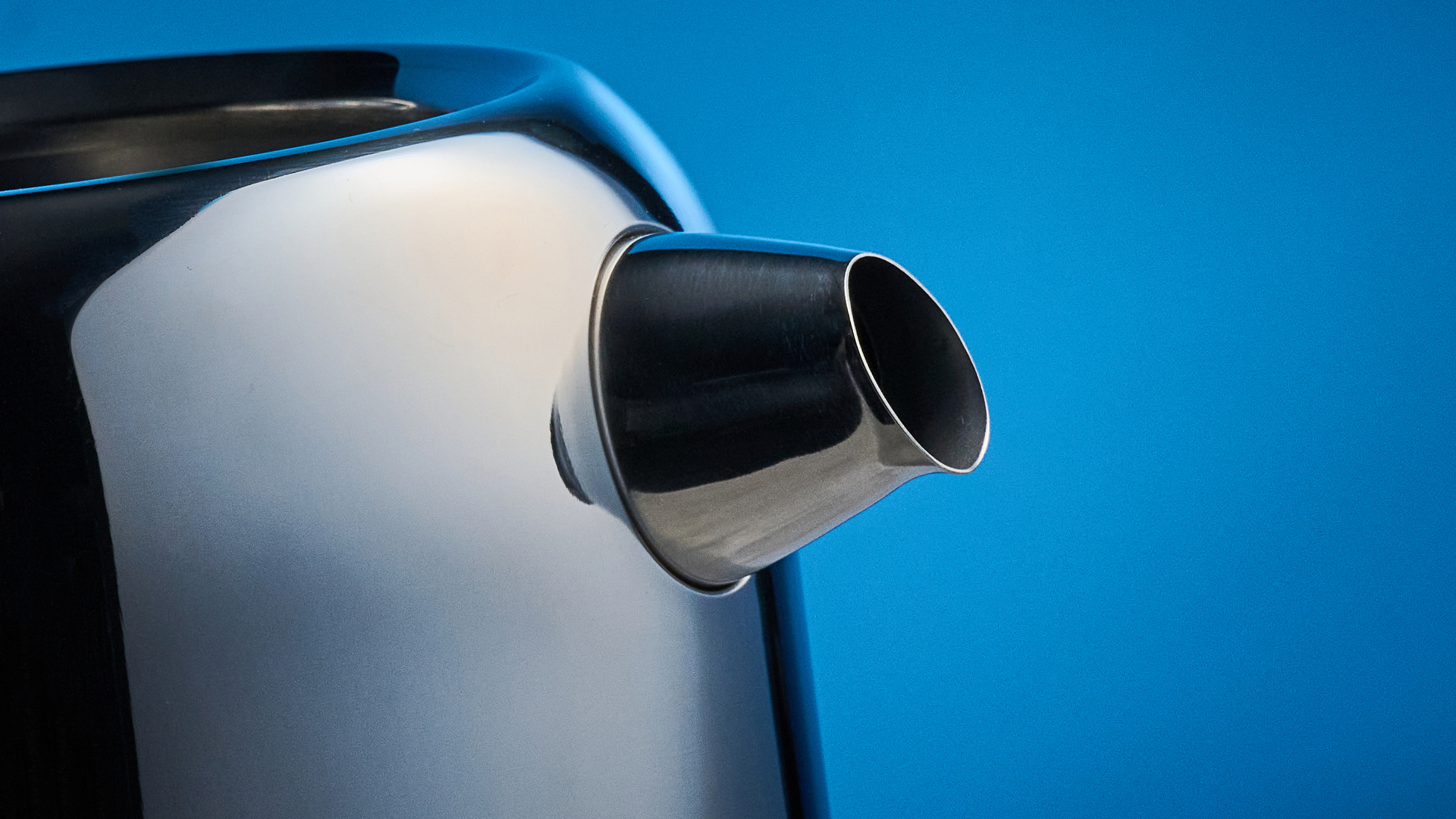 Dualit Classic Kettle photographed in front of a blue background