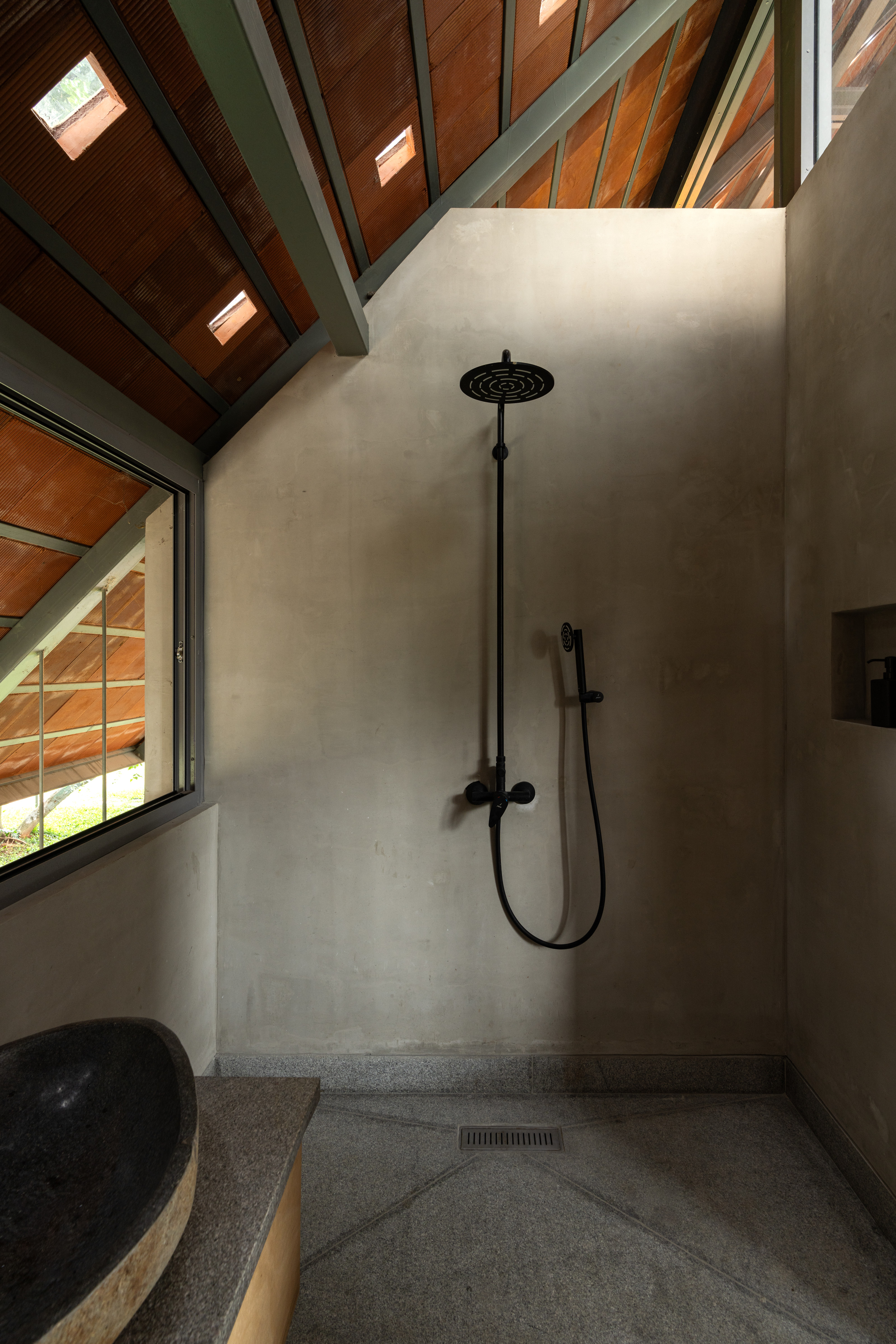 The upstairs bathroom tucked into the eaves