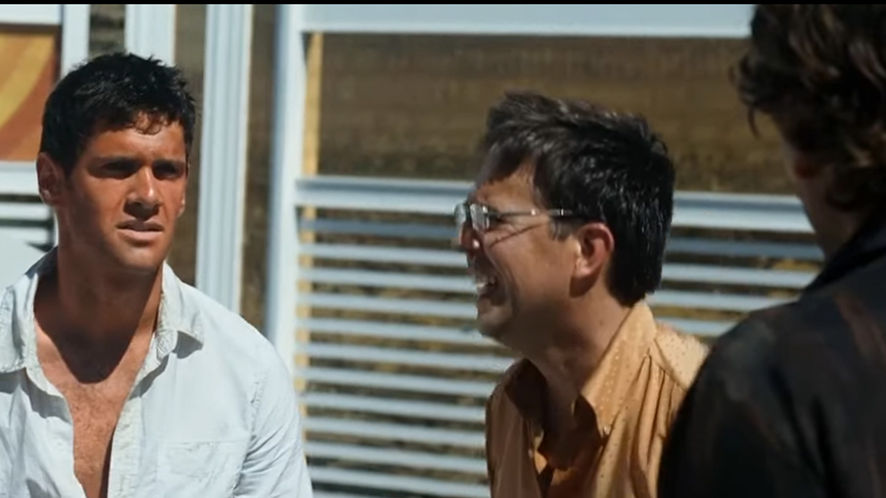 A very sunburned Doug in the Hangover with Ed Helms looking concerned.