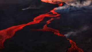 A river of lava flowing from a volcano in Iceland