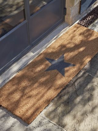 Coir doormat with star motif