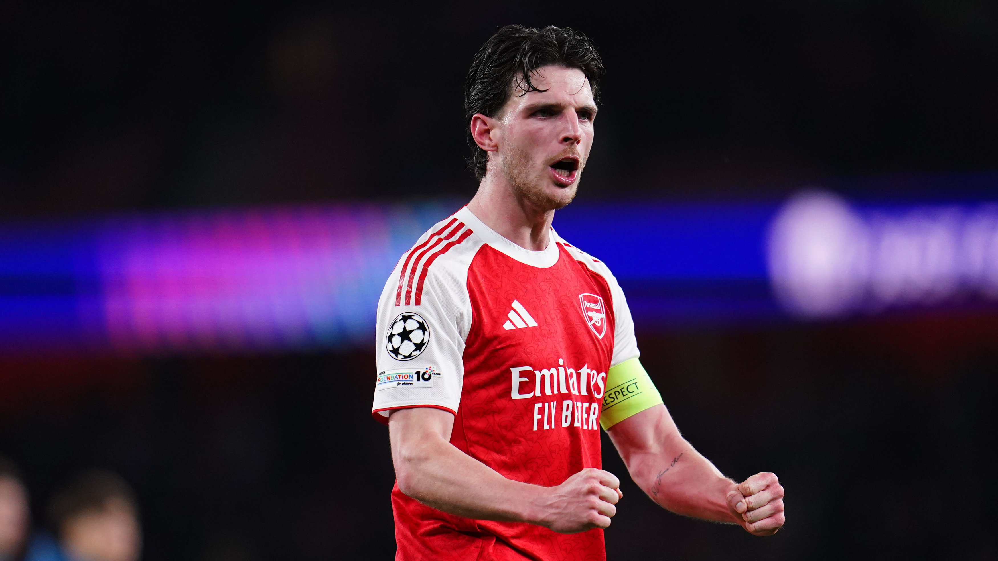 Declan Rice of Arsenal celebrates reaching the semi-finals during the UEFA Champions League Quarter Finals match between Arsenal and Sporting CP