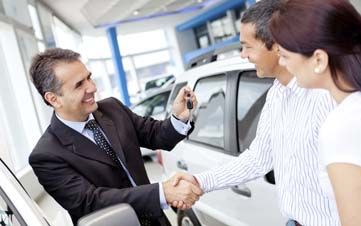 Couple buying a car