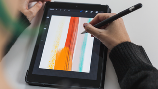Procreate brushes - A photo of someone drawing on their iPad