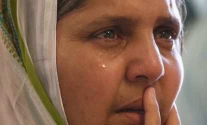 Ranjit Kaur weeps as she listens to information about the shooting spree at a Sikh temple in Oak Creek, Wis., on Sunday. Members of the Sikh community in Wisconsin continue to mourn the death