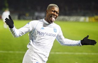 Auxerre's forward Djibril Cisse celebrates after scoring against Utrecht during their UEFA match at the Abbe Deschamps stadium in Auxerre 27 November 2003.