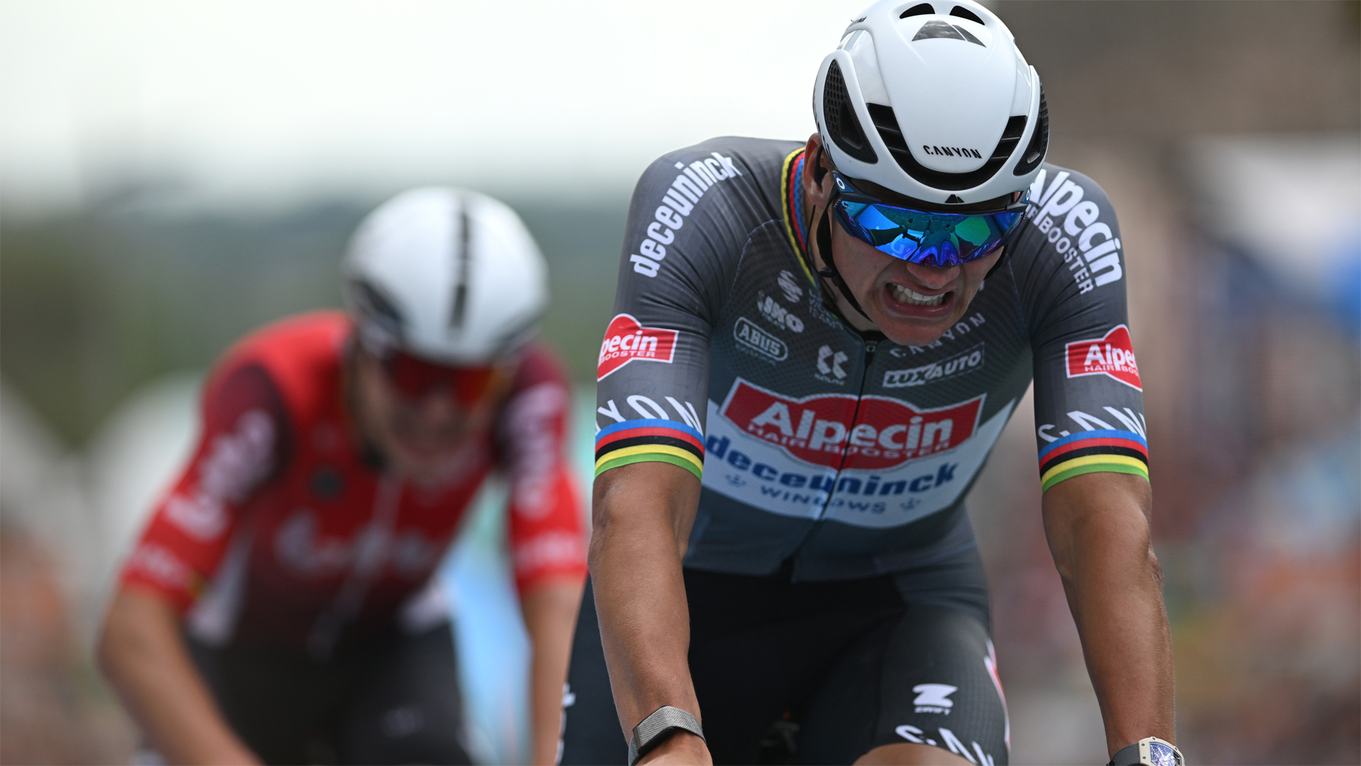 Mathieu Van Der Poel grimaces as he crosses the finish line as stage 3 winner during the 20th Renewi Tour 2025.