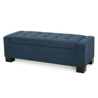 blue fabric storage ottoman