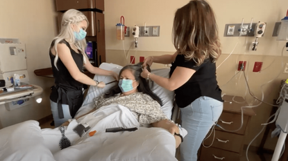Brooke Johns braids a patient's hair at Southern Hills Hospital in Las Vegas.