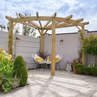 radial wooden timber pergola over seats and decked area