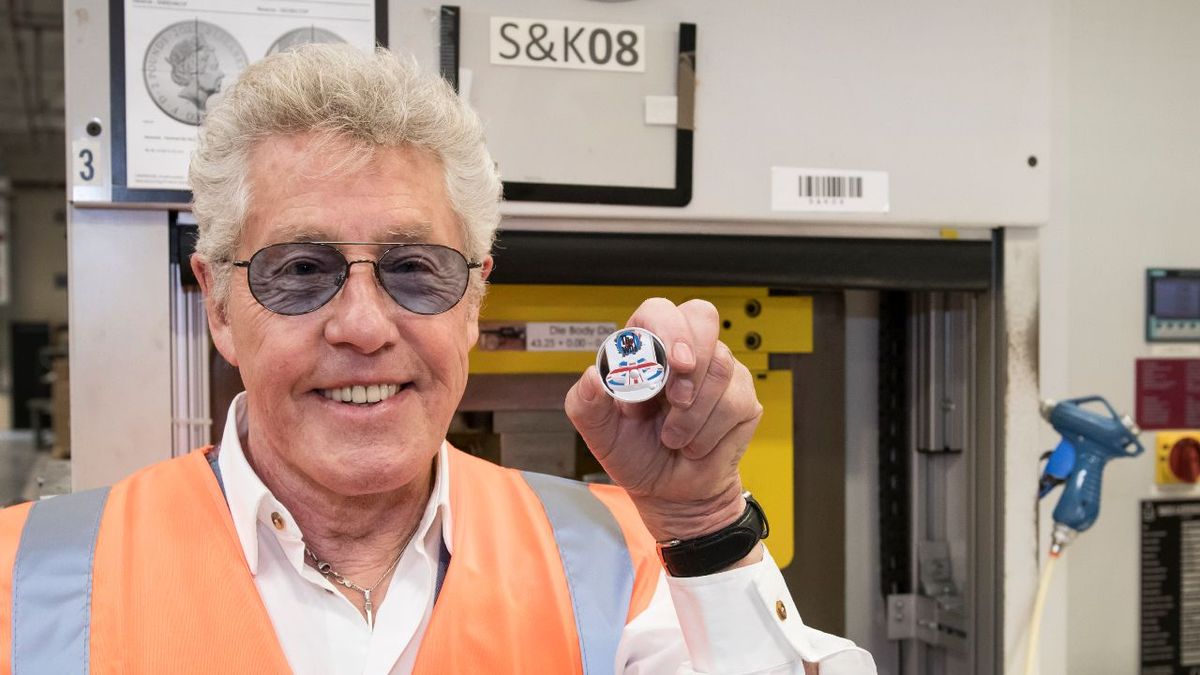 Roger Daltrey with a coin