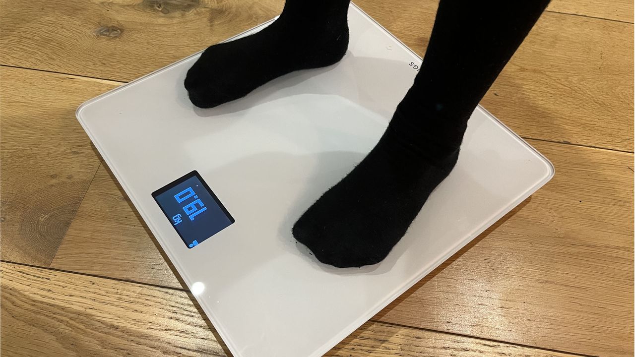 Withings Body smart scale being used by Live Science contributor Maddy Bidulph