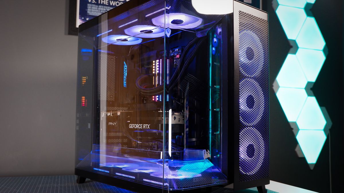 A Corsair Air 5400 PC case on a desk with various parts installed.
