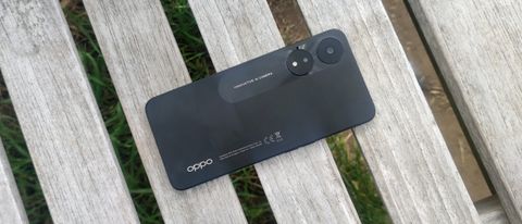 The Oppo A78 laid down on a bench