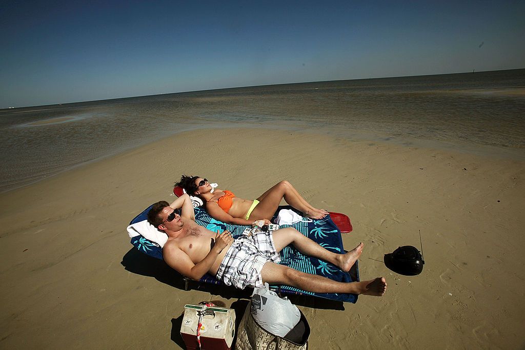 People at a Mississippi beach.