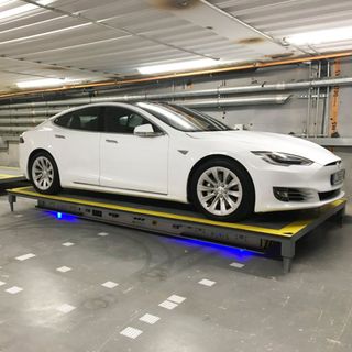 basement car parking with white car