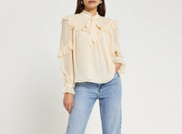 Cream Ruffled Tie Neck Blouse, was £32, now £25.60This cute ruffled blouse is best teamed with jeans and boots.