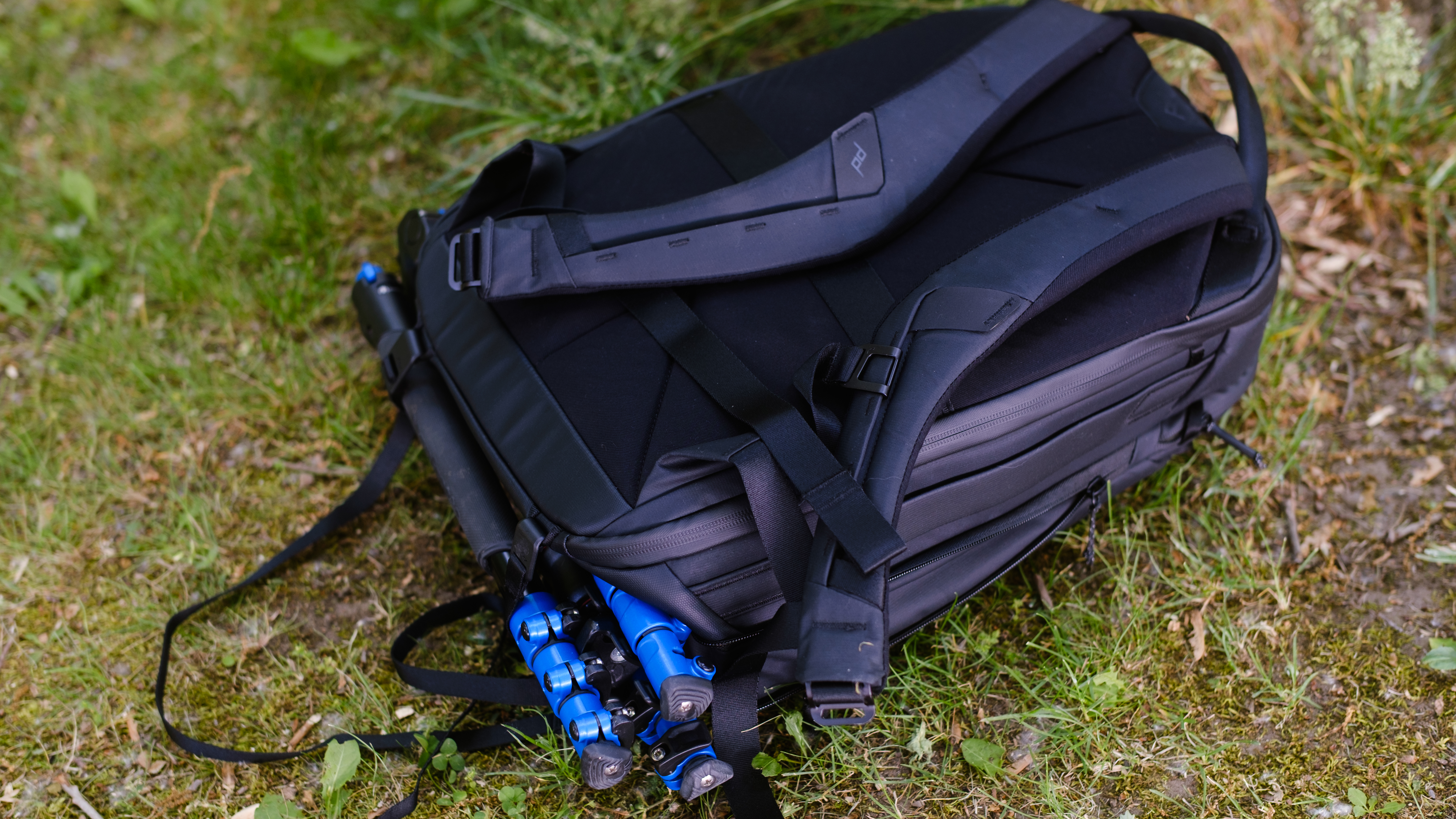 The Peak Design Travel Backpack 20L in use by a photographer
