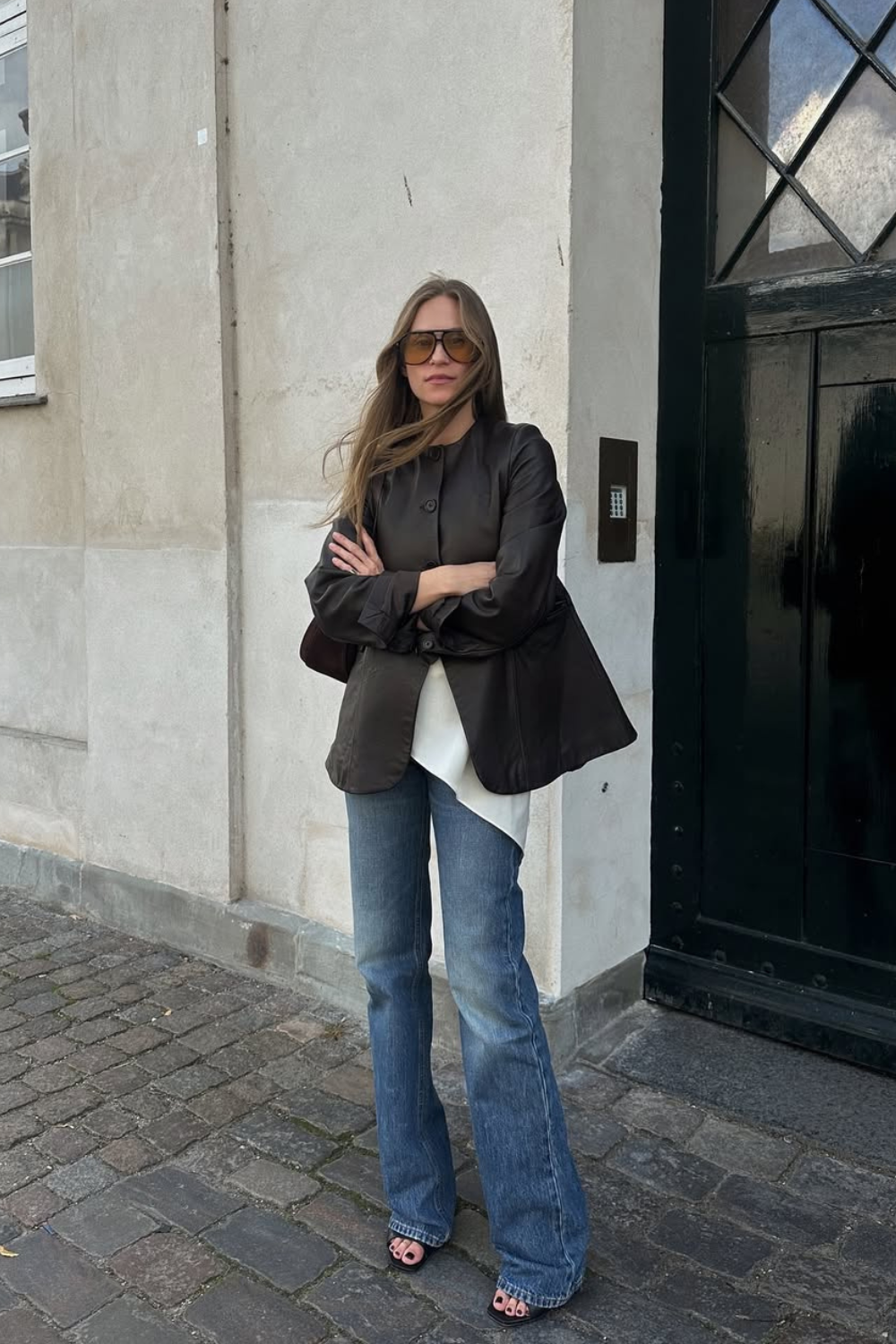 @tineandreaa wears black leather jacket and jeans