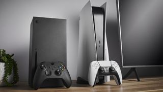 Xbox Series X and PS5 next to each other on a desk.