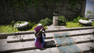 A Guardian stands at the memorial to Cayde-6.