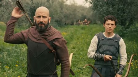 Tom Holland and Jon Bernthal hunting in The Odyssey, both are wearing some leather armor. 