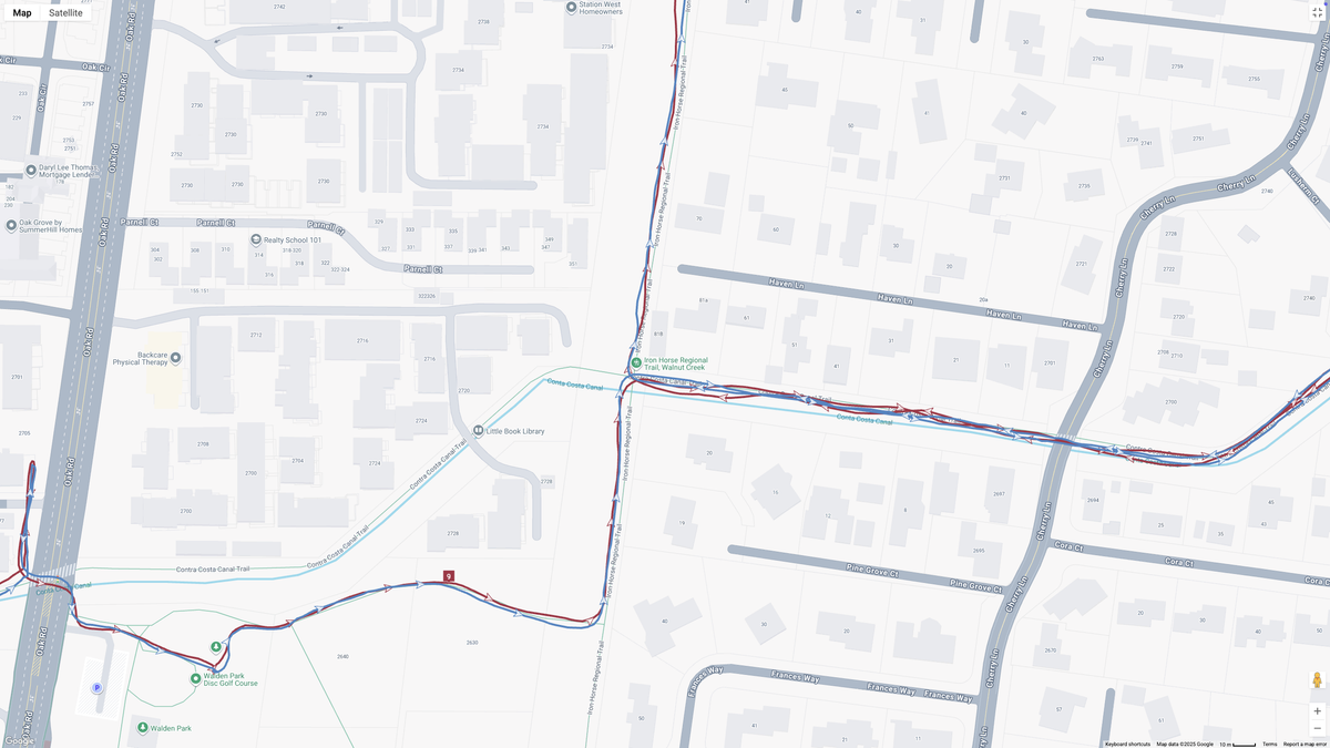 A Google Maps view of GPS run data from the Google Pixel Watch 4 (red) and Garmin Forerunner 970 (blue).