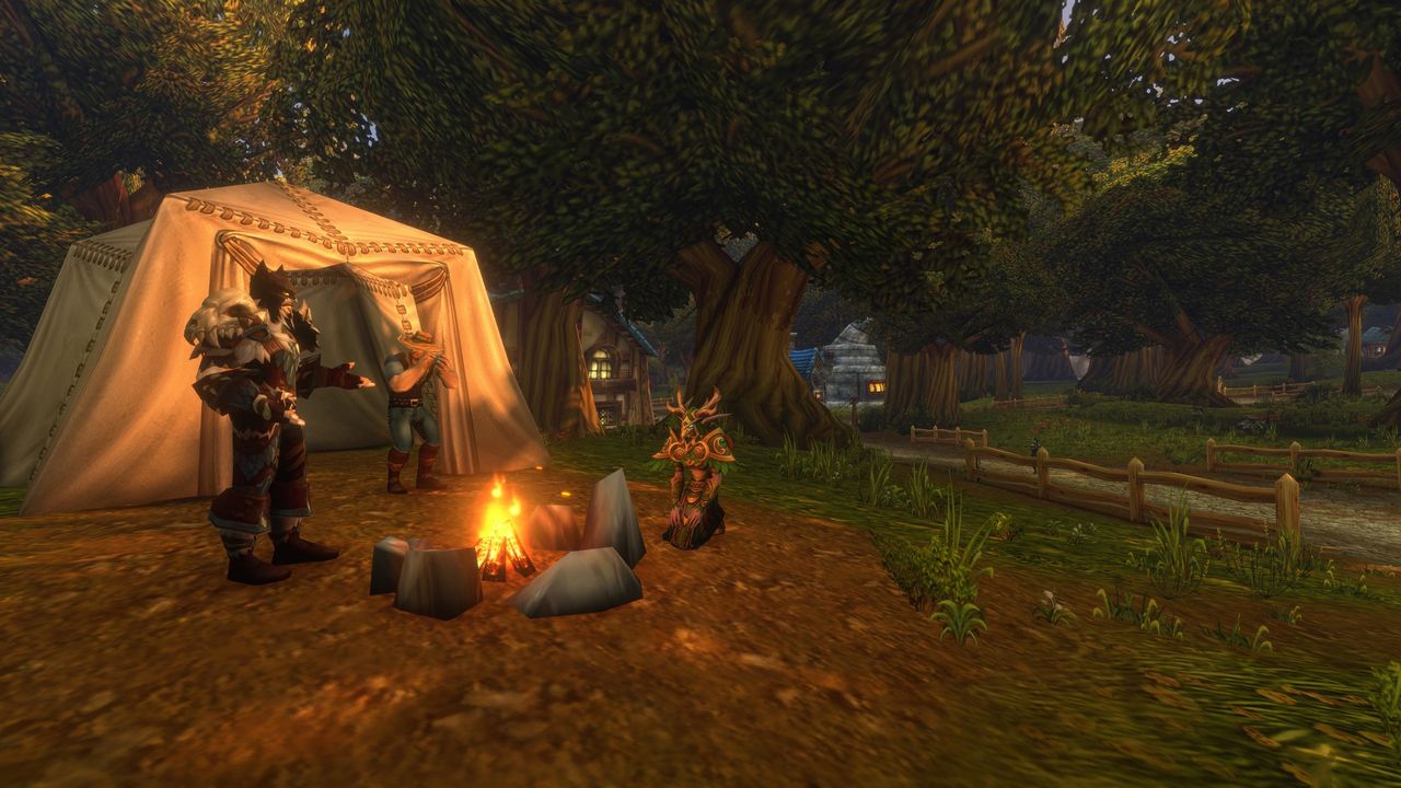 Players gather around a campfire in World of Warcraft: Forever in a forest location