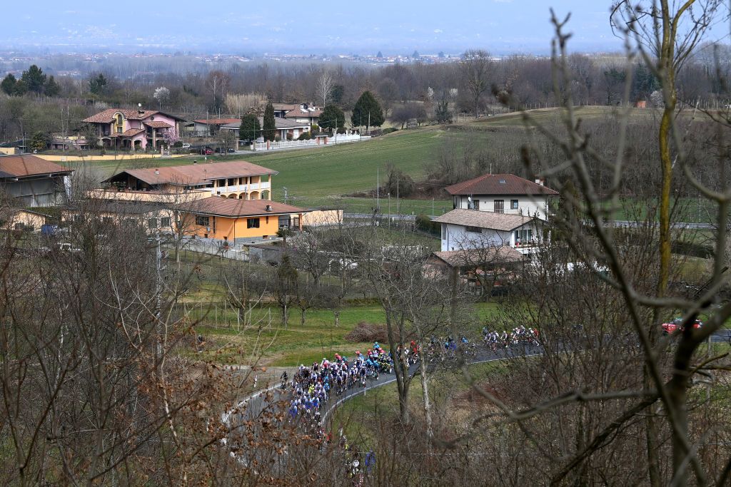 MILAN ITALY MARCH 16 A general view of the peloton competing during the 103rd MilanoTorino 2022 a 197km one day race from Magenta to Rivoli MilanoTorino on March 16 2022 in Milan Italy Photo by Tim de WaeleGetty Images