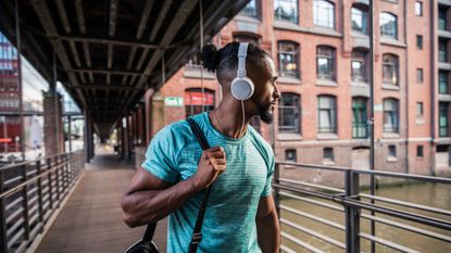 Man on his way to the gym, listening to gym motivation songs