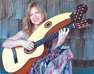 Muriel Anderson with her short-scale Mike Brittain harp guitar.