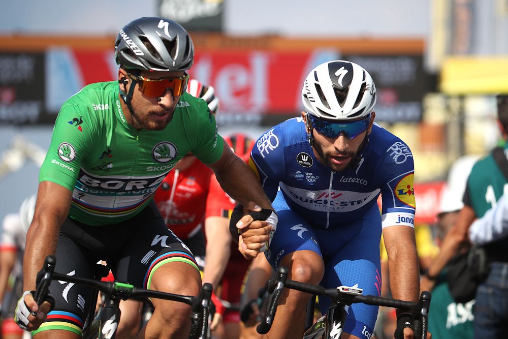 Peter Sagan congratulates Fernando Gaviria as they cross the line during stage 4 at the Tour de France