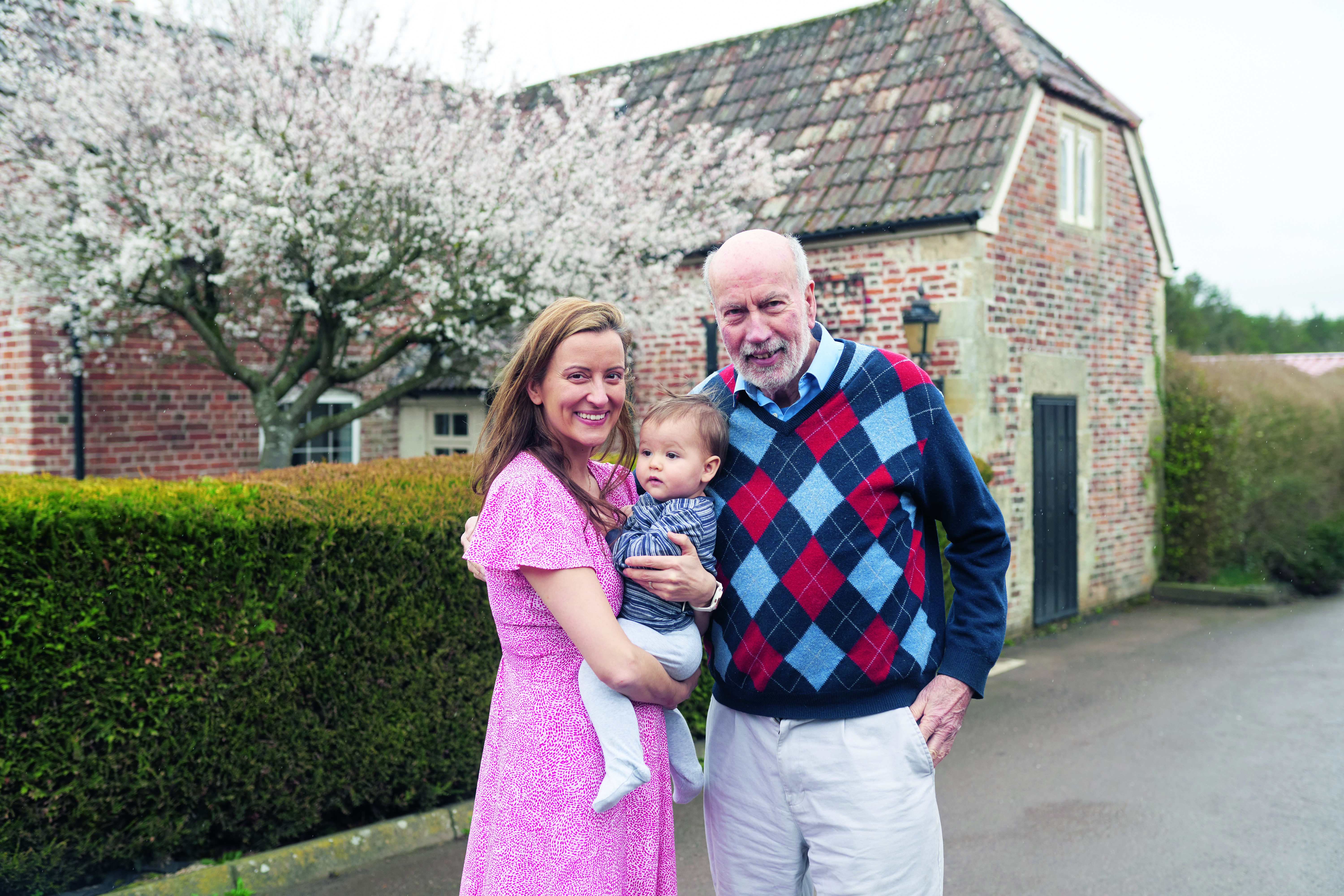 Kim Willis with her son and father