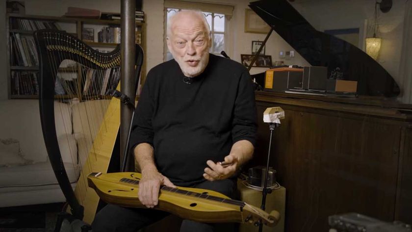 David Gilmour sitting down with a dulcimer on his lap