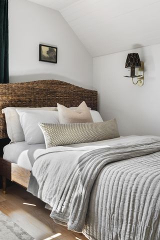 guest room with rattan headboard
