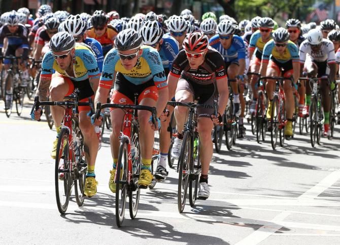 Veteran rider Adam Myerson (Team SmartStop- Mt. Khakis) shows his teammate, Jackie Simes how to chase down a break