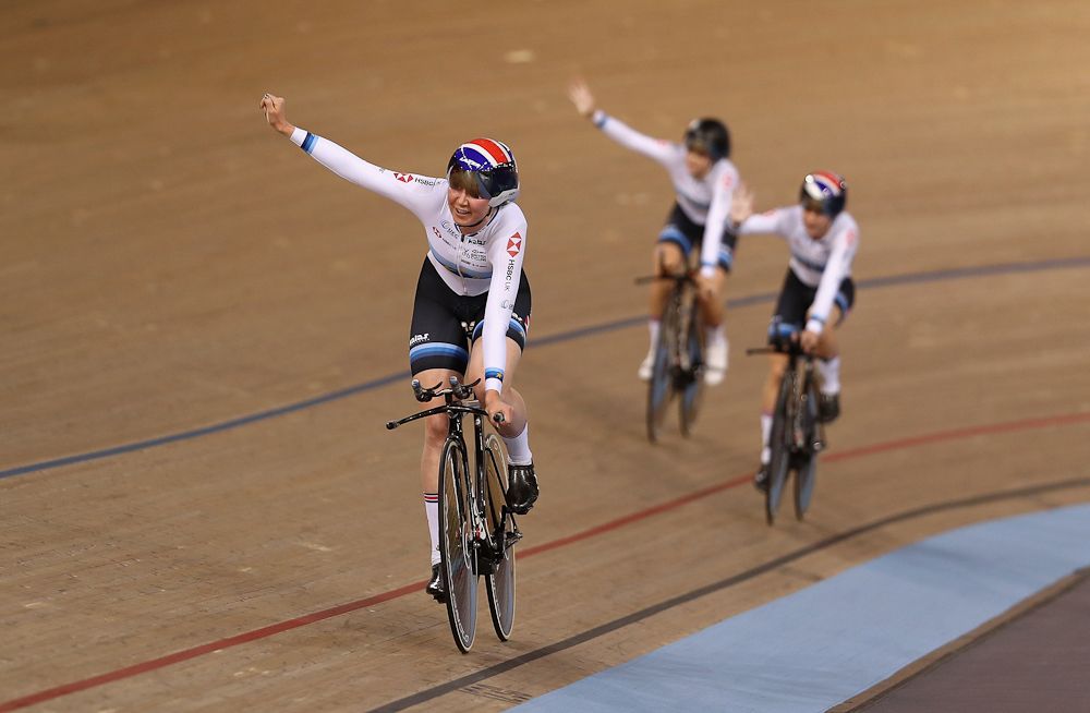 Eleanor Dickinson of Great Britain(L) waves to the crowd during day One of the 2018 TISSOT UCI Track Cycling World Cup at Lee Valley Velopark Velodrome