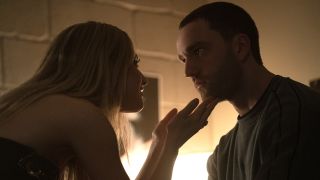 College student Lucy (Grace Van Patten) shares an intimate moment with Stephen (Jackson White) as she stares into his piercing, dark-brown eyes in a still from Tell Me Lies Season 3.