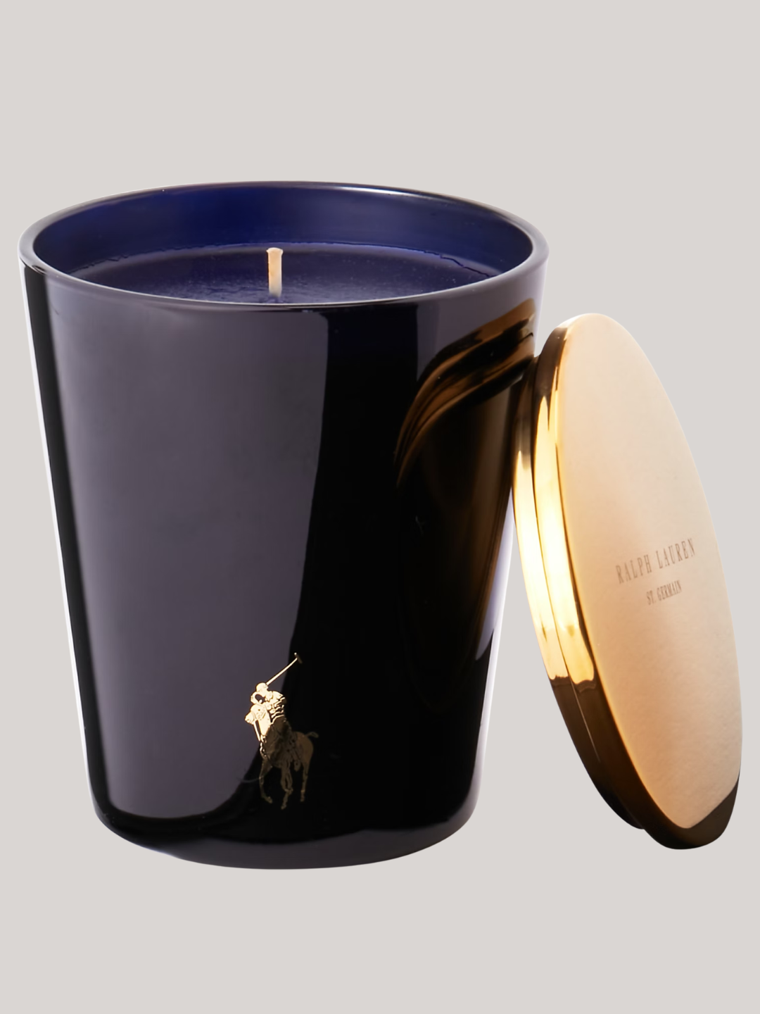A dark blue glass scented candle from Ralph Lauren Home
