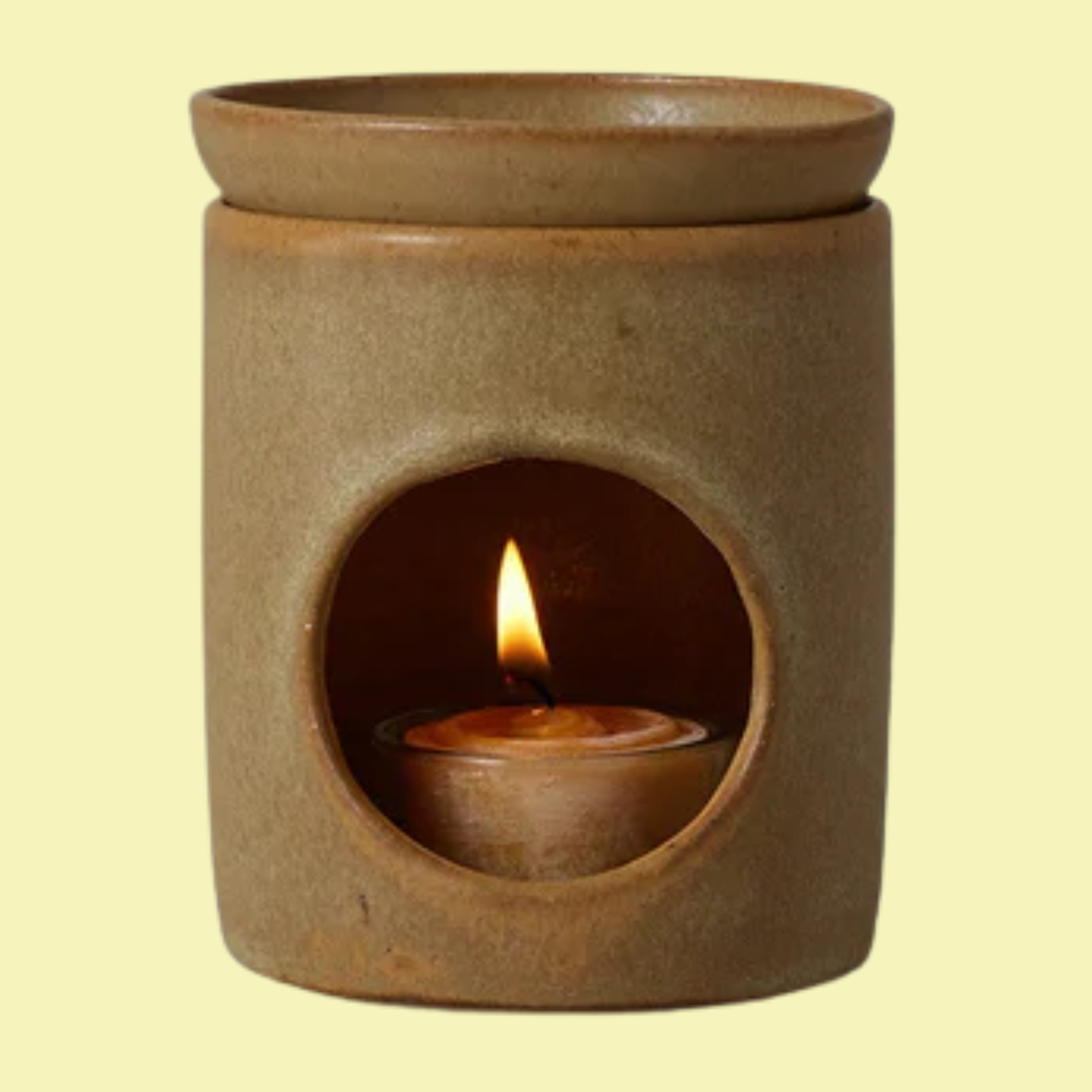 A sandy brown ceramic tealight oil burner